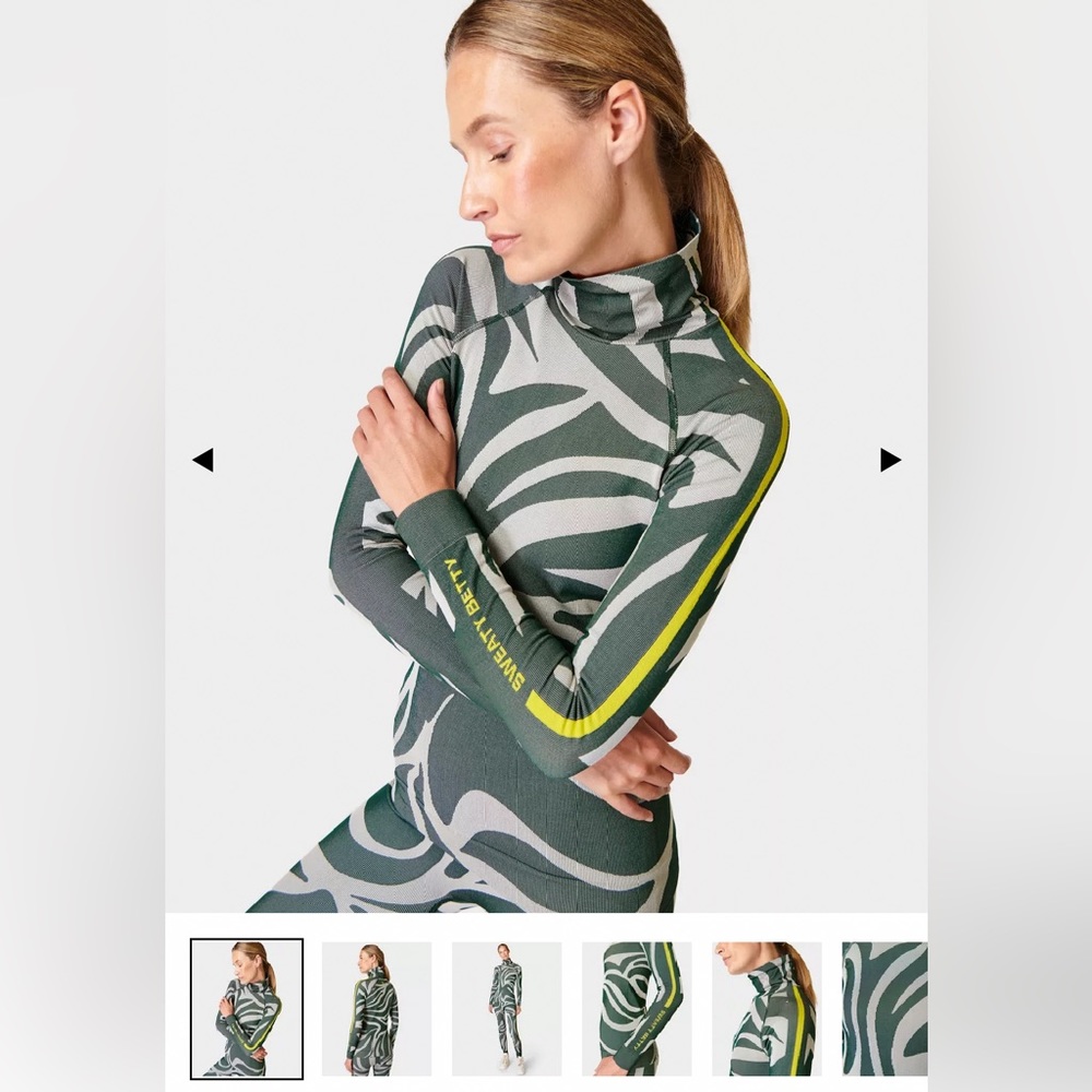 New with tags. Sweaty Betty Animal Funnel Neck green Base Layer Top.